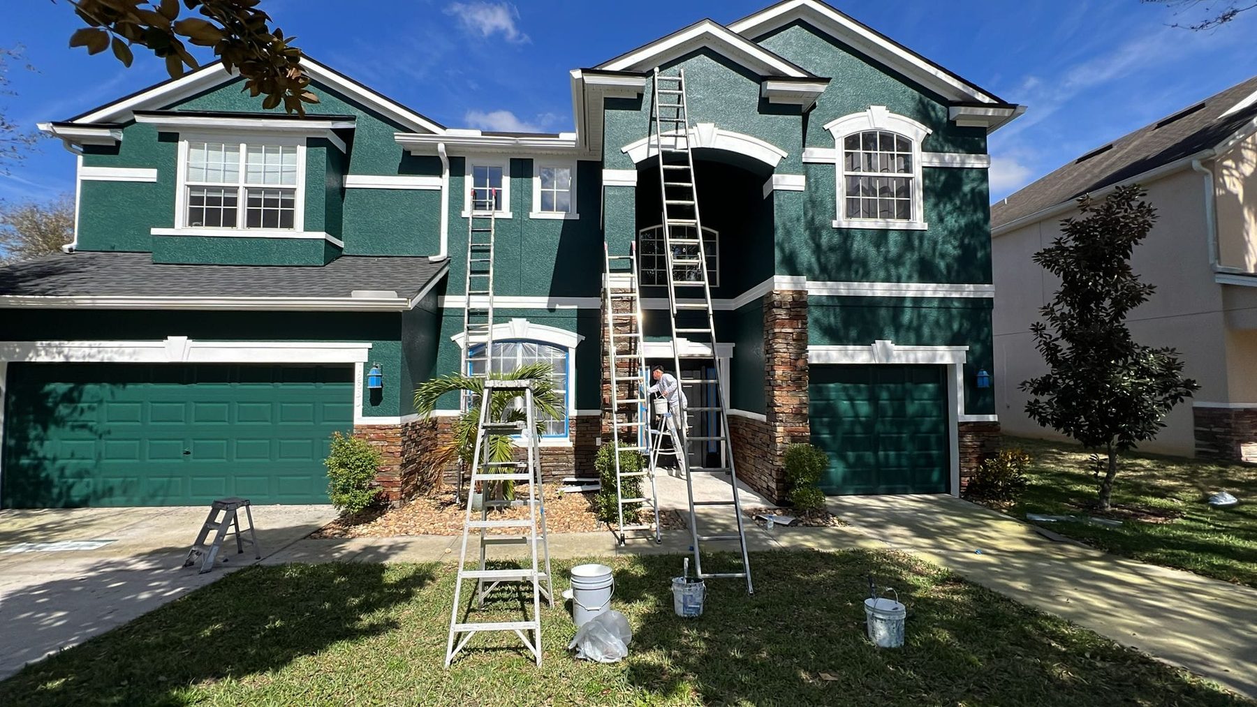 Exterior House Painting and Trim Repair