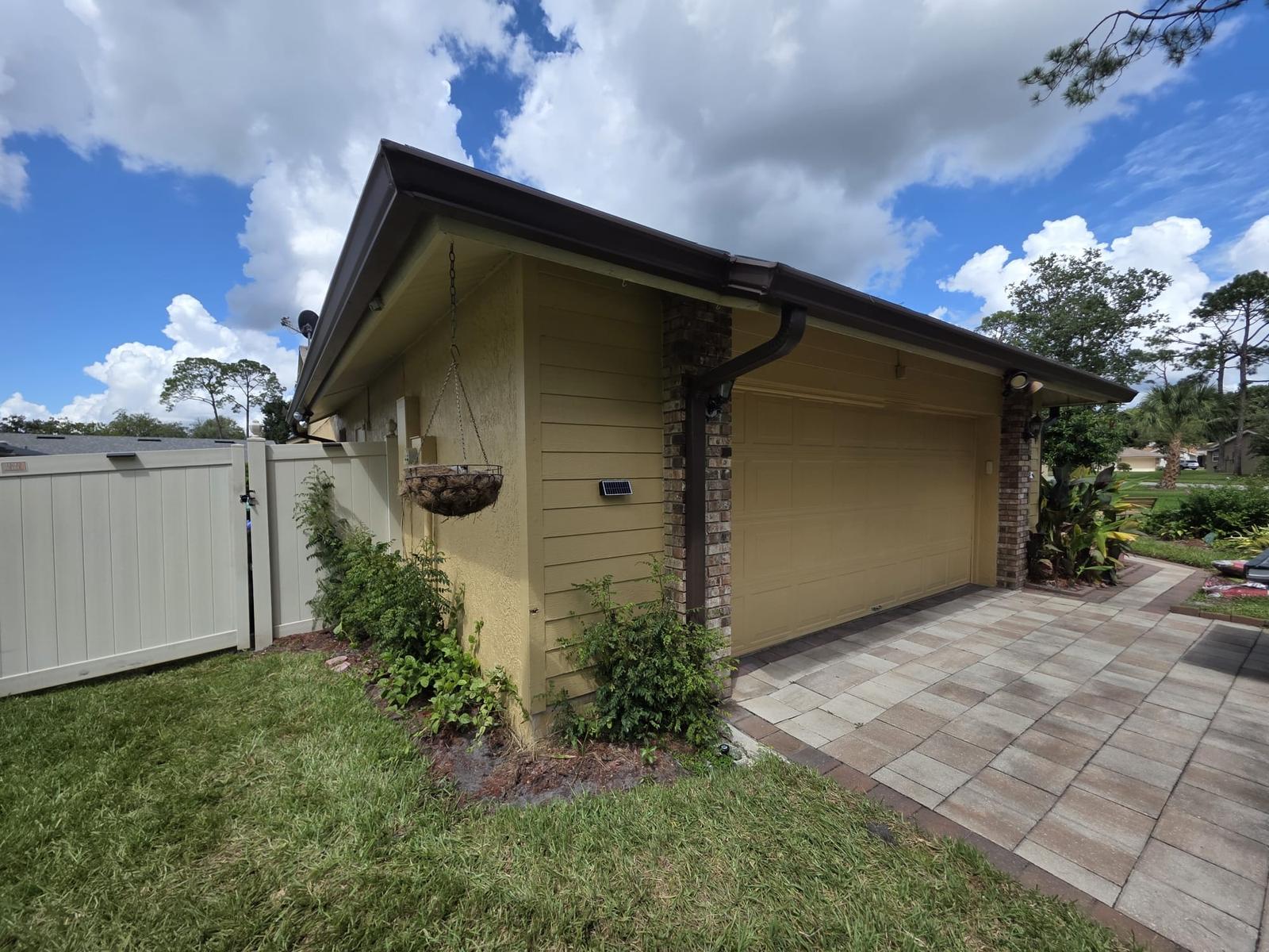 Exterior Repaint, Stucco Repairs and Siding Replacement