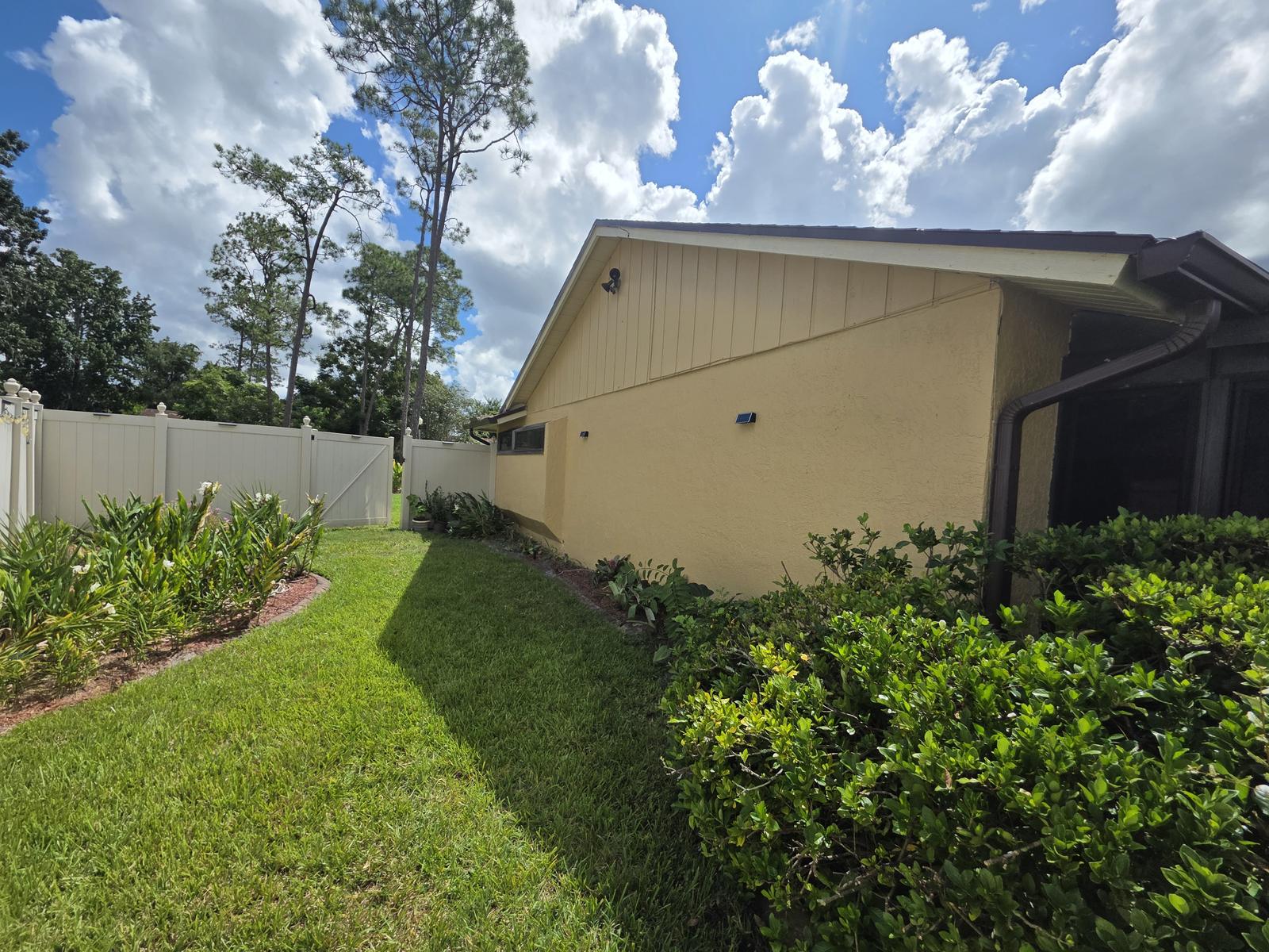 Exterior Repaint, Stucco Repairs and Siding Replacement